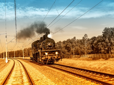Steam train moves toward in the Moscow region.