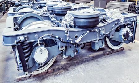 Several railway wheels inside the plant building.の写真素材