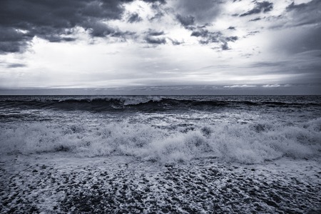 Sunset sea view at the stormy time.の写真素材