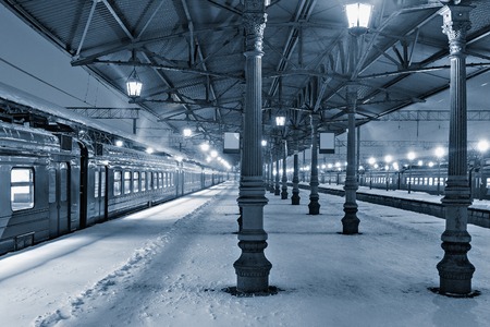 Night view of the station platforms at snowy cold winter time.の写真素材