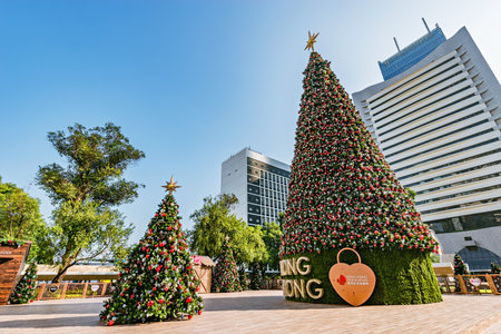 Hong Kong, China - December 16, 2016: Christmas trees on the city square in the Central District.のeditorial素材