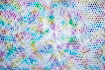 Blurred image of colorful woman bag leather texture background.