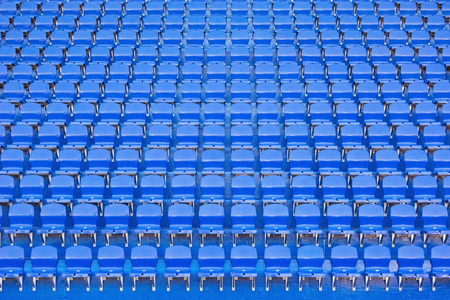 Blue empty seats on the tribune of the new stadium.の写真素材
