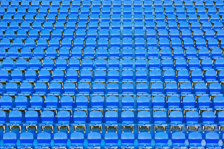 Blue empty seats on the tribune of the new stadium.の写真素材