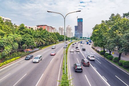 Car traffic on the city street. Shenzhen. China.の写真素材