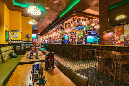 Krasnaya Polyana, Russia - October 14, 2019: Interior of Harats Irish pub at day time.のeditorial素材