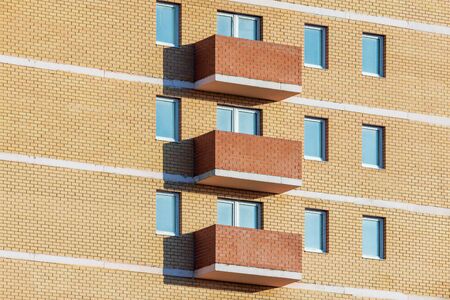 Windows and balconies of the residential modern building.の写真素材