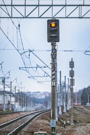 Trafficlight by the railway track.の写真素材