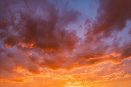 Amazing cloudscape on the sky at sunset time.