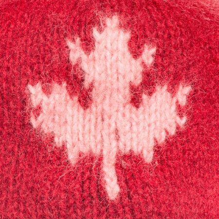 Canadian symbol on the red woolen background.の写真素材
