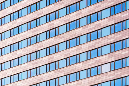 Exterior of the new office building at evening time.の写真素材
