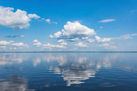 View of the lake at windless weather timeの写真素材