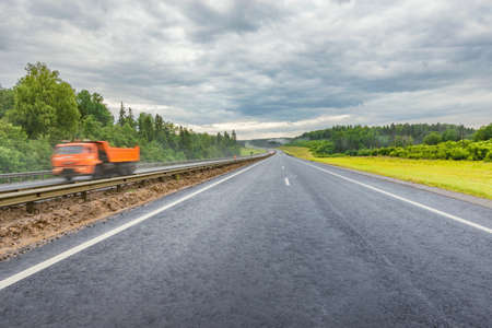 View of the new highway at cloudy summer morning.の写真素材