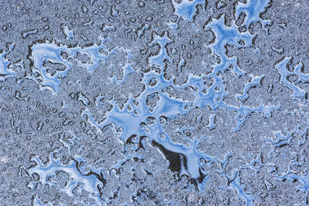Water drops on the new asphalt road surface.の写真素材