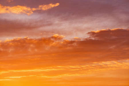 Colorful clouds after rain at sunset time.の写真素材
