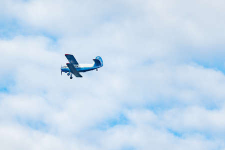 Flight of the retro plane in the sky.の写真素材