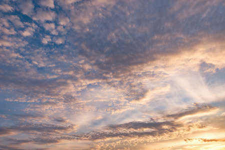 Colorful clouds after rain at sunset time.の写真素材