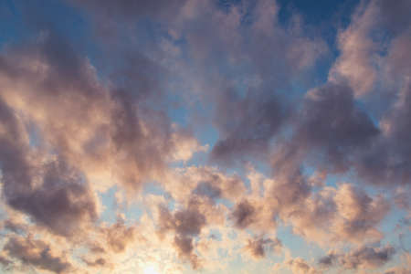 Colorful clouds after rain at sunset time.