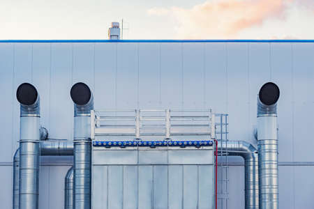 Pipes of the air conditioning system by the plant building.の写真素材