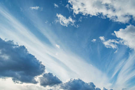 White clouds on the sky at evening time.の写真素材