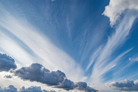 White clouds on the sky at evening time.の写真素材