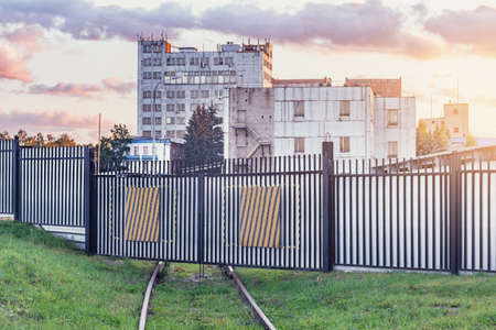 Railway track to the plant territory.の写真素材