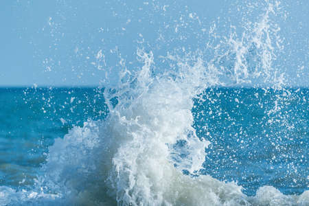 Wave of the sea water at sunny day time.の写真素材