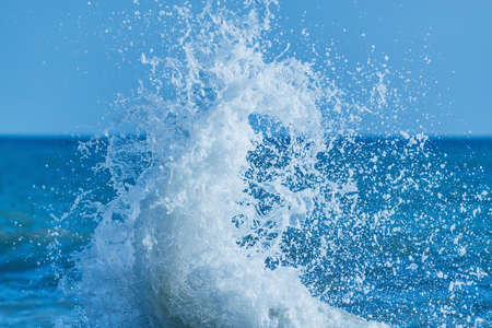 Wave of the sea water at sunny day time.の写真素材