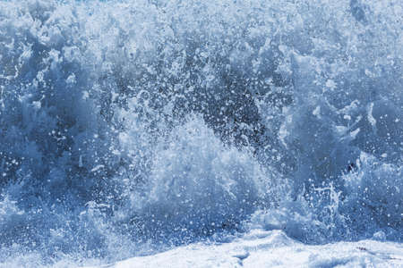 Wave of the sea water at sunny day time.の写真素材