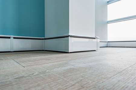 White plinth along the wall and floor.の写真素材