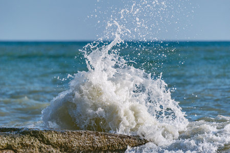 Wave of the sea water at sunny day time.の写真素材