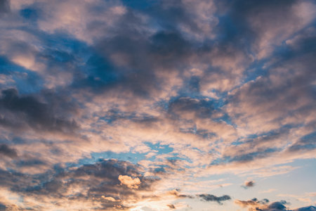 Amazing cloudscape on the sky at sunset time after rainの写真素材