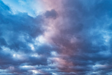 Cloudy skies after rain at sunset time.の写真素材