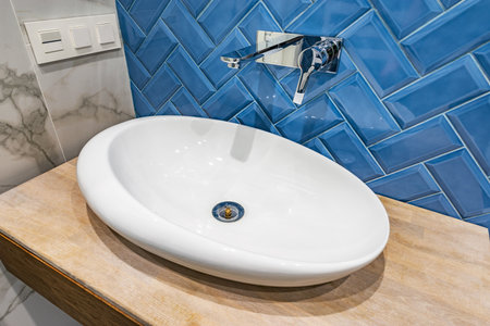 Close uo image of the white sink in the bathroom.の写真素材