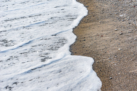 Wave of the sea water at evening time.の写真素材