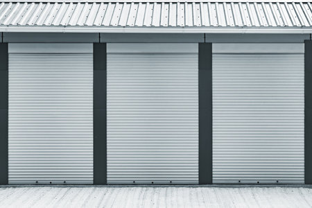 Metal gray gates of the shop storage.の写真素材