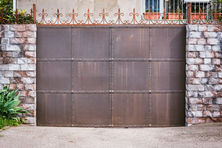 Metallic new gate by the private house.の写真素材