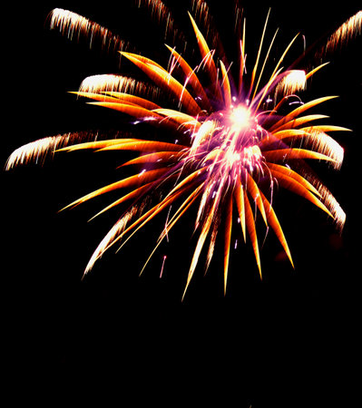 Fireworks in the night winter sky. New year celebration.の写真素材