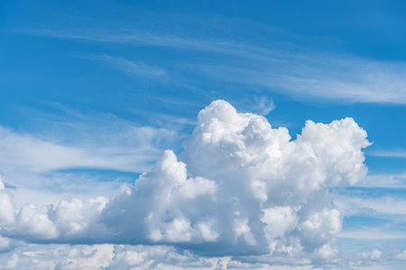 White clouds on the blue sky at day time.の写真素材