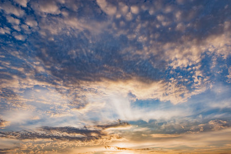 Amazing cloudscape on the sky at sunset time after rain.の写真素材