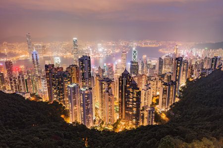 View of the downtown of Hong Kong from Victoria Peak at evening time.の写真素材