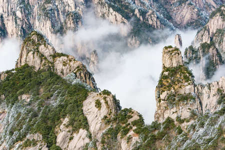 Clouds above the peaks of Huangshan National park. China.の写真素材