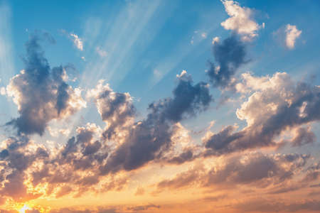 Amazing colorful clouds on the evening sunset sky.の写真素材