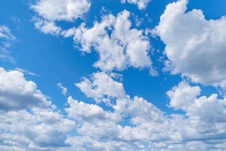 White clouds on the blue sky at day time.の写真素材