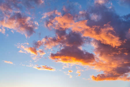 Amazing colorful clouds on the evening sunset sky.の写真素材