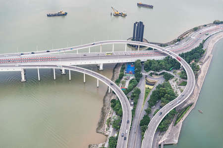 Aerial view of the highways on the ocean background. Macao.の写真素材