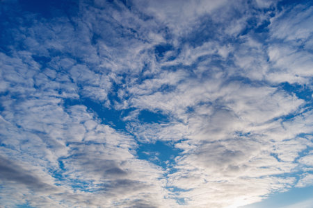 Amazing cloudscape on the sky at sunset time after rainの写真素材