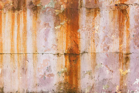 Ancient red wall background with cement.