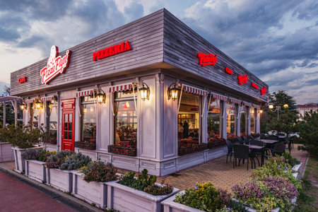 Sochi, Russia - April 16, 2021: Exterior of pizzeria Pizza Papi by the sea coast.のeditorial素材
