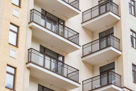 Balconies and windows of the new apartment house.の写真素材